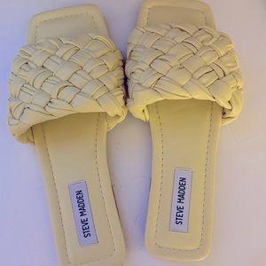 Pale yellow braided Steve Madden slides